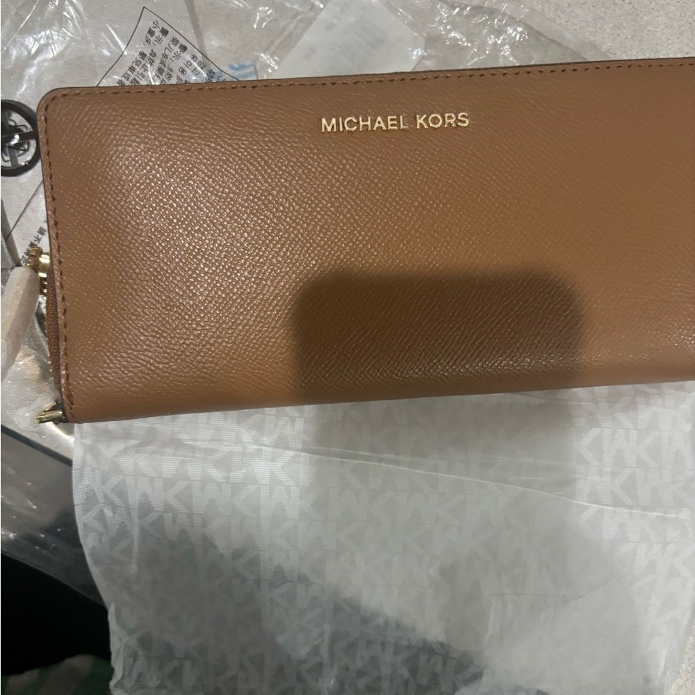 Michael Kors Brown tan acorn color Wallet wristlet